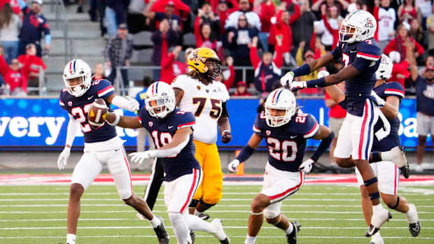 Arizona football players celebrate during game against Arizona State.